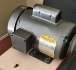 Baldor 1/2 Horse L3409 Electric Motor With Wired Switch And Belt Pulley. Fixed Price $265.00.