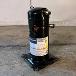 Copeland Compressor 208/230V Sz 9"L 9"W 15"H, Black ZP21LXE-PFV-800. Fixed Price $1039.36.